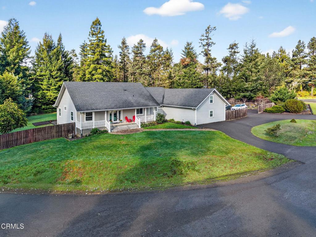 18970 Quail Lane Fort Bragg, CA 95437 - Photo 34 of 36 a view of a house with a yard and sitting area