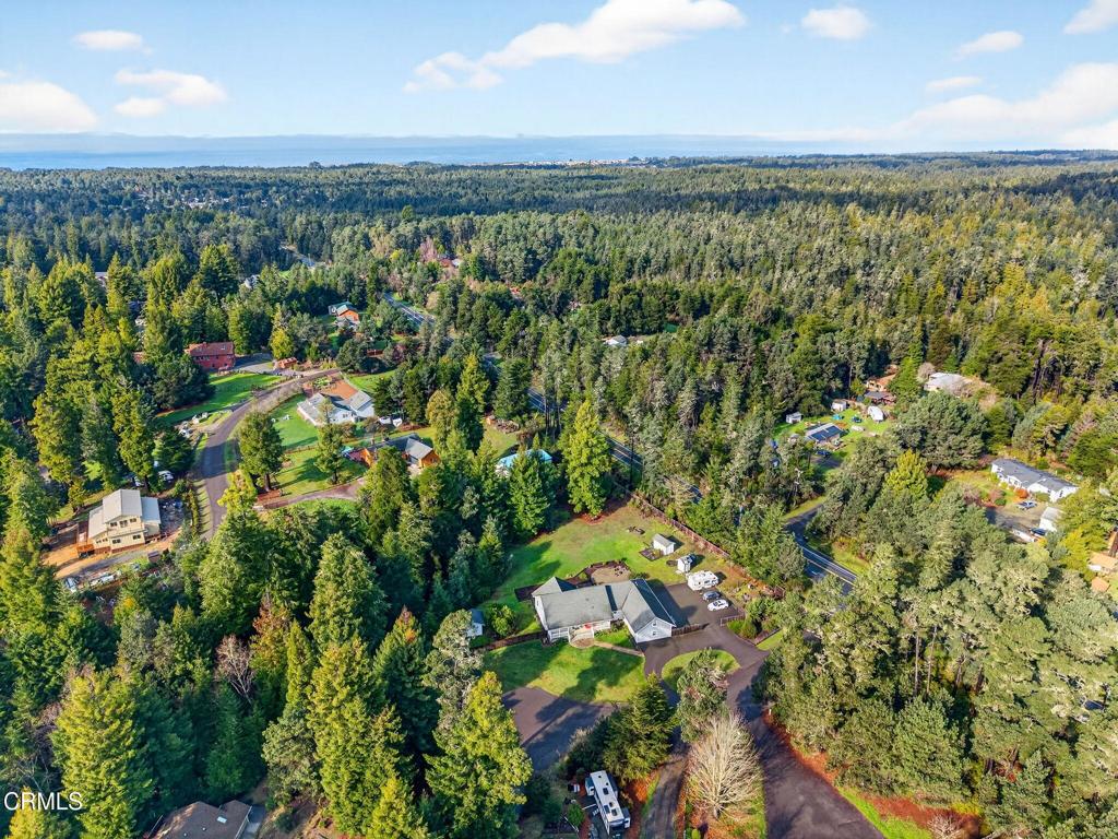 18970 Quail Lane Fort Bragg, CA 95437 - Photo 35 of 36 an aerial view of a houses with a yard