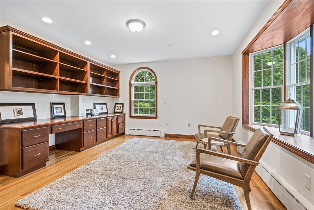 282 High Street Winchester, MA 01890 - Photo 11 of 26 a living room with furniture and a large window