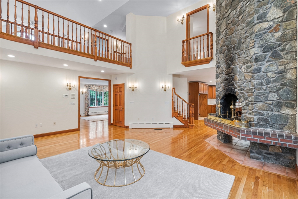 282 High Street Winchester, MA 01890 - Photo 13 of 26 a living room with furniture and a fireplace