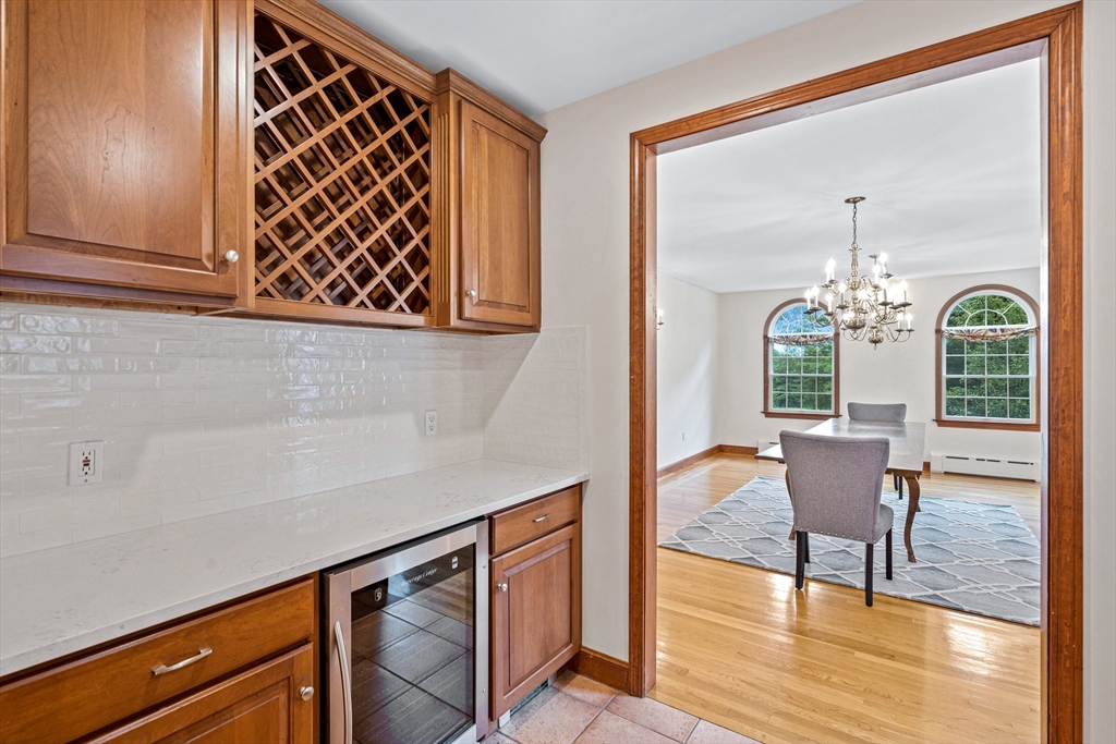 282 High Street Winchester, MA 01890 - Photo 14 of 26 a view of chair and table in a room