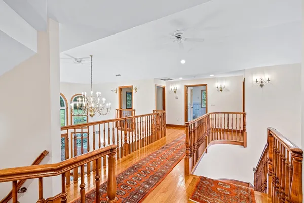 a view of a hallway with an entryway