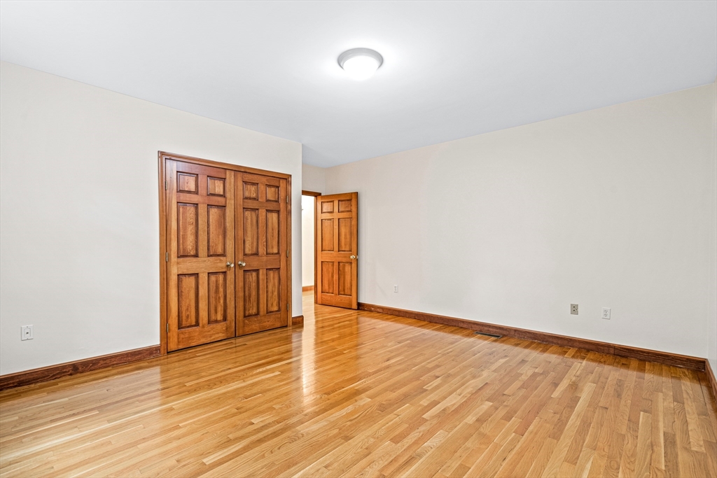 282 High Street Winchester, MA 01890 - Photo 21 of 26 a view of an empty room with wooden floor