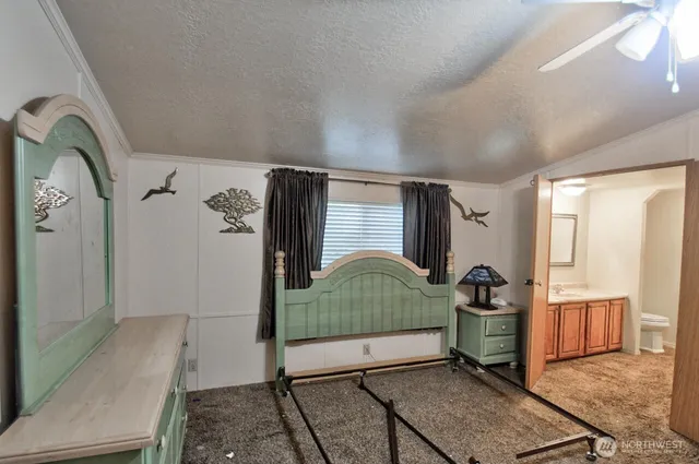 a view of livingroom with furniture and refrigerator