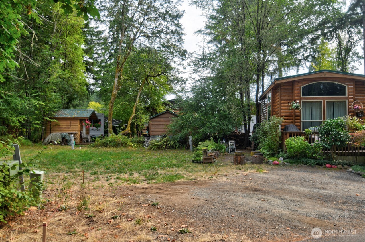 1546 Reservation Road Southeast, Unit 137 Olympia, WA 98513 - Photo 5 of 20 a front view of a house with a yard