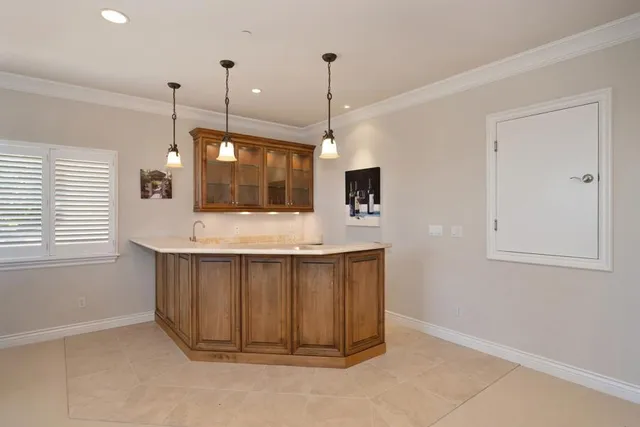 a large spacious bathroom with a large tub and sink