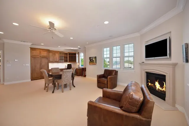 a large bathroom with a large tub and sink