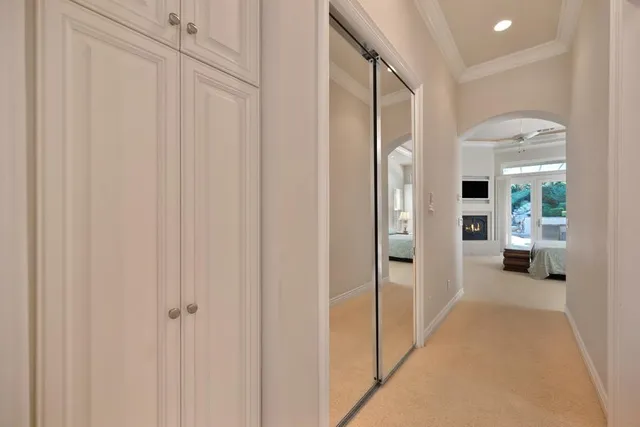 a view of a patio with table and chairs and potted plants