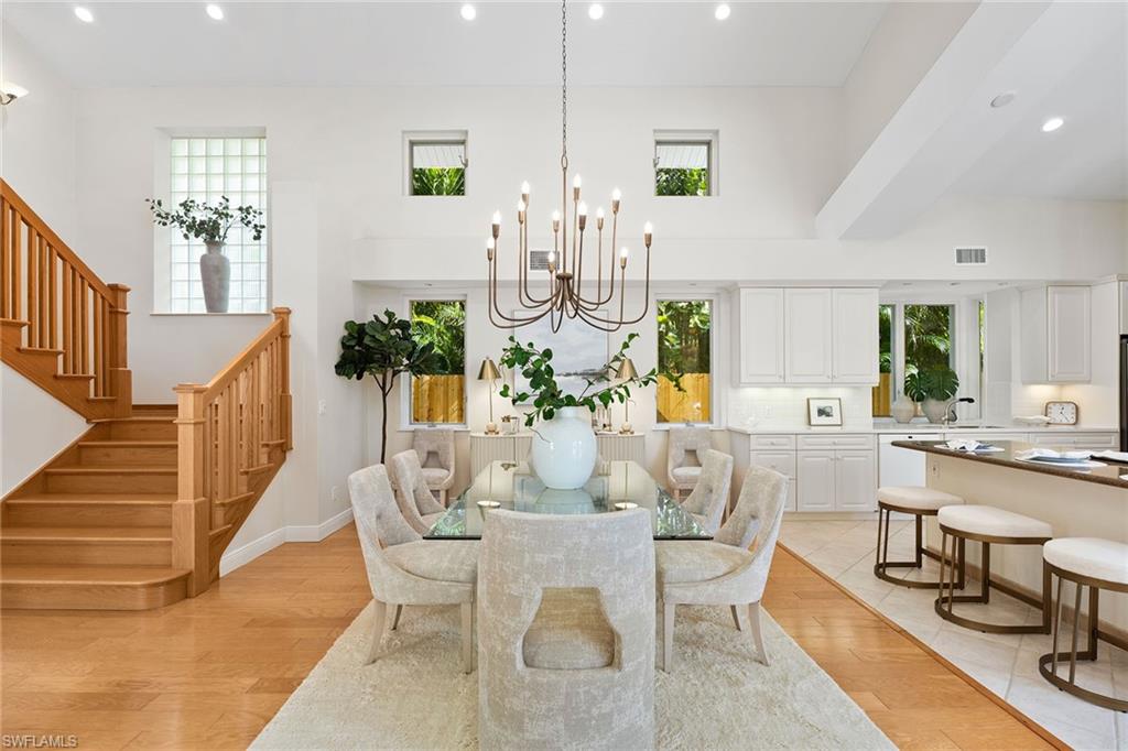 416 3rd Avenue North Naples, FL 34102 - Photo 15 of 50 a view of a dining room with furniture