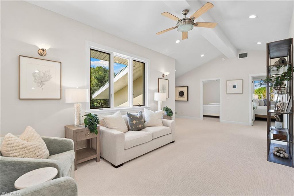 416 3rd Avenue North Naples, FL 34102 - Photo 30 of 50 a living room with furniture and a large window