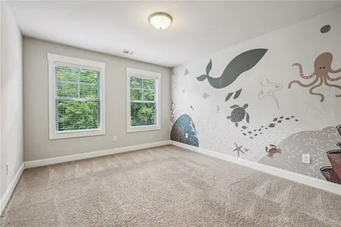 a view of a livingroom with a dry plant