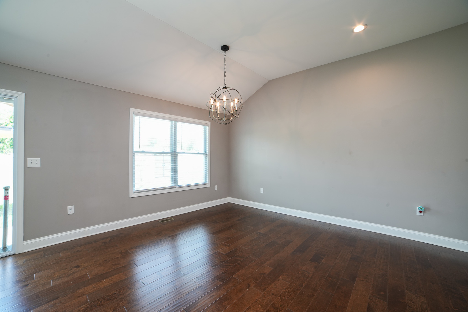 282 Patton Turn Bradley, IL 60915 - Photo 11 of 37 an empty room with wooden floor and windows