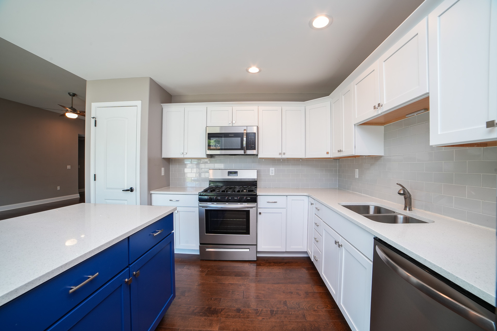282 Patton Turn Bradley, IL 60915 - Photo 14 of 37 a kitchen with stainless steel appliances granite countertop a sink and a stove