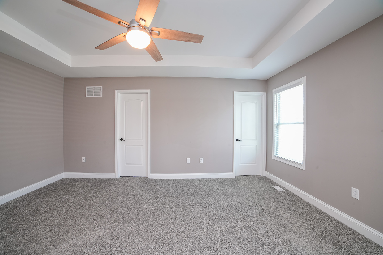 282 Patton Turn Bradley, IL 60915 - Photo 18 of 37 a view of an empty room with window and chandelier fan