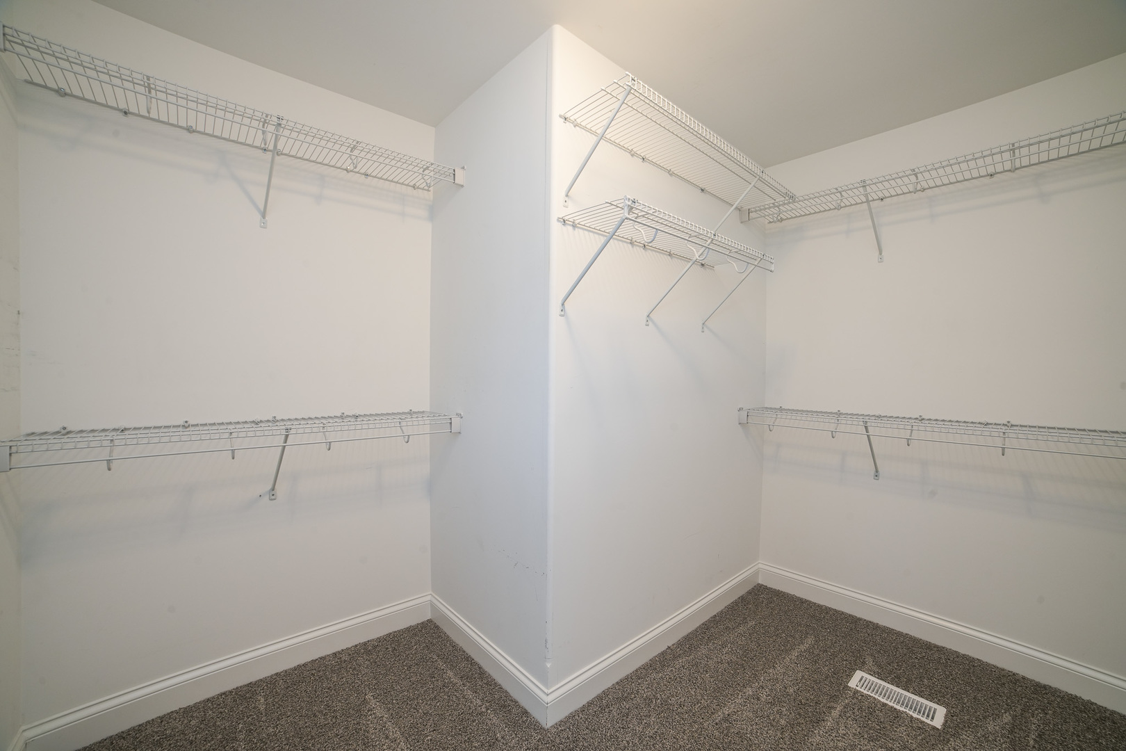 282 Patton Turn Bradley, IL 60915 - Photo 22 of 37 a view of a room with racks on the wall