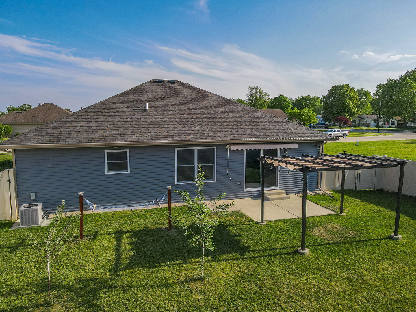 282 Patton Turn Bradley, IL 60915 - Photo 34 of 37 a backyard of a house with table and chairs