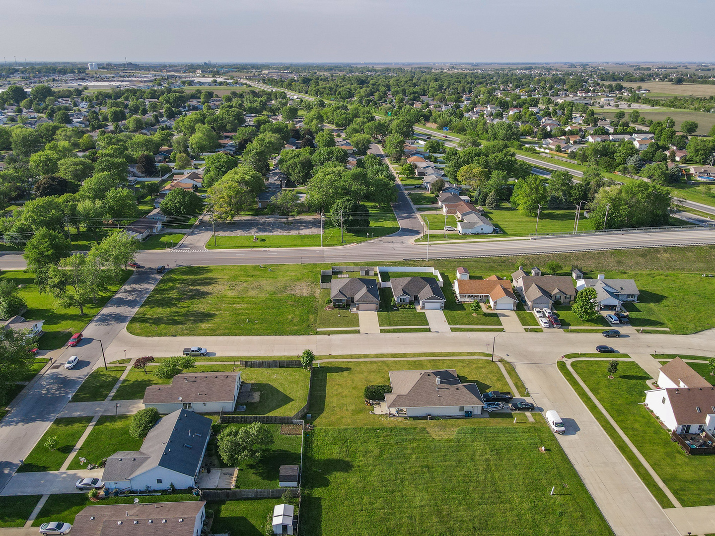 282 Patton Turn Bradley, IL 60915 - Photo 4 of 37 an aerial view of a swimming pool with a yard