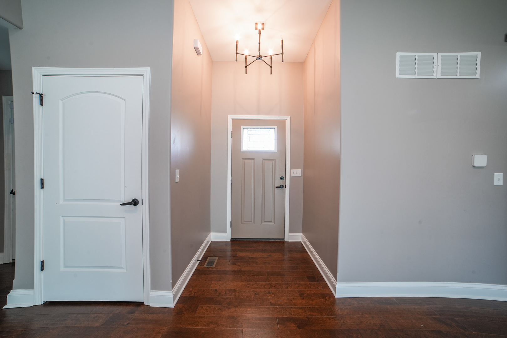 282 Patton Turn Bradley, IL 60915 - Photo 5 of 37 a view of a hallway with wooden floor
