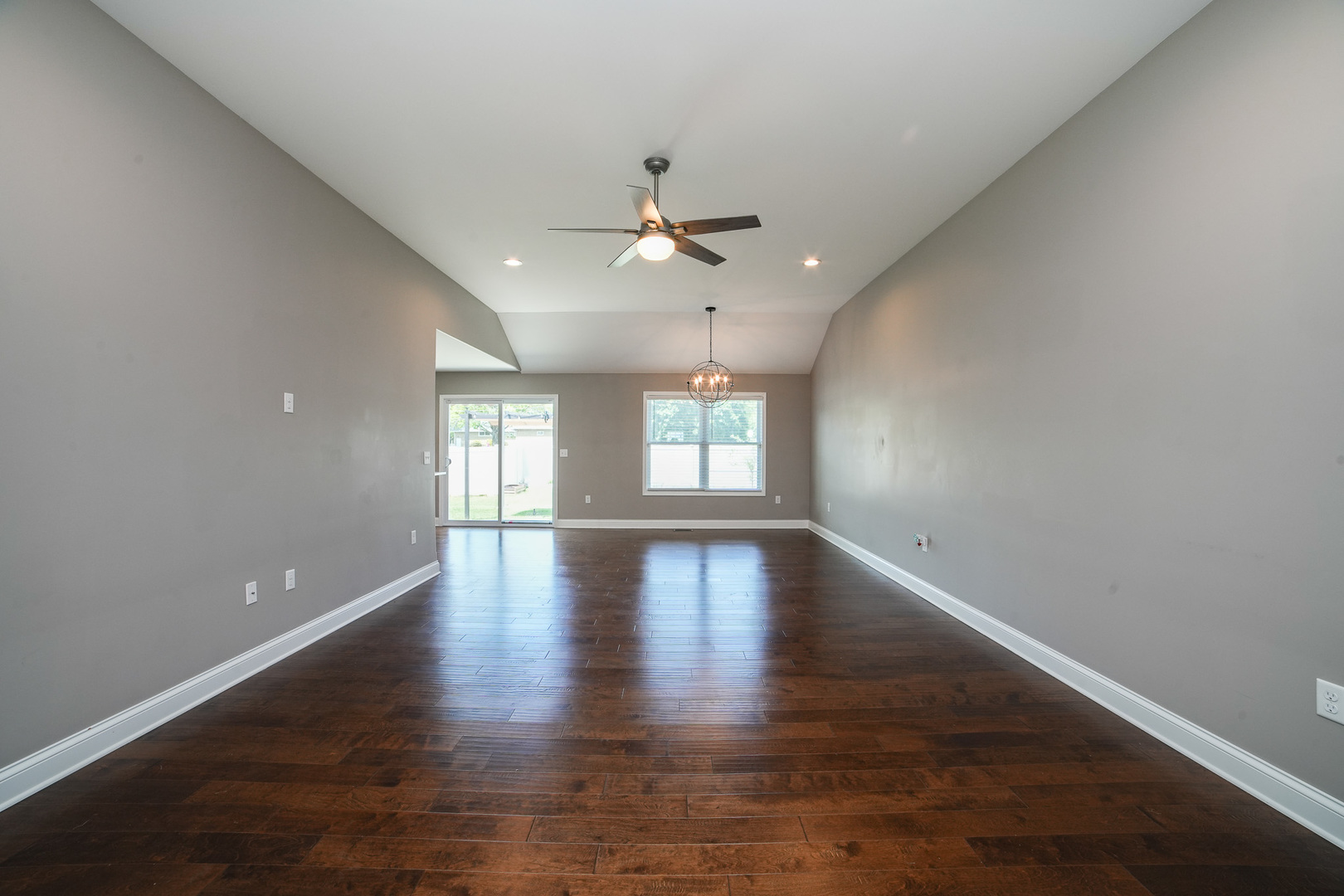 282 Patton Turn Bradley, IL 60915 - Photo 6 of 37 wooden floor in an empty room with a window