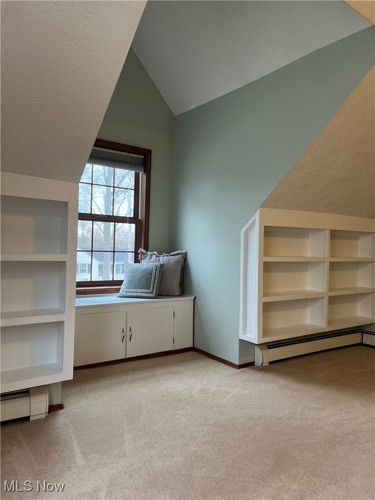 140 Overlook Road Painesville, OH 44077 - Photo 30 of 47 Built in bookshelves and window seat in alcove