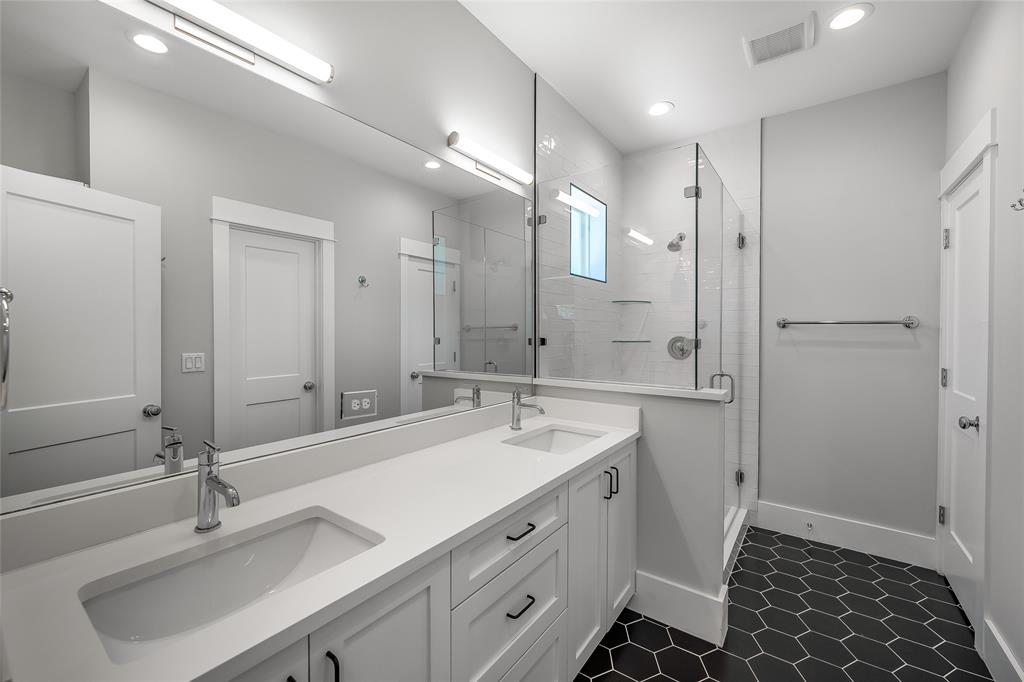 2821 Castro Street, Unit 1 Austin, TX 78702 - Photo 15 of 21 Double vanity with integrated sinks and white countertops