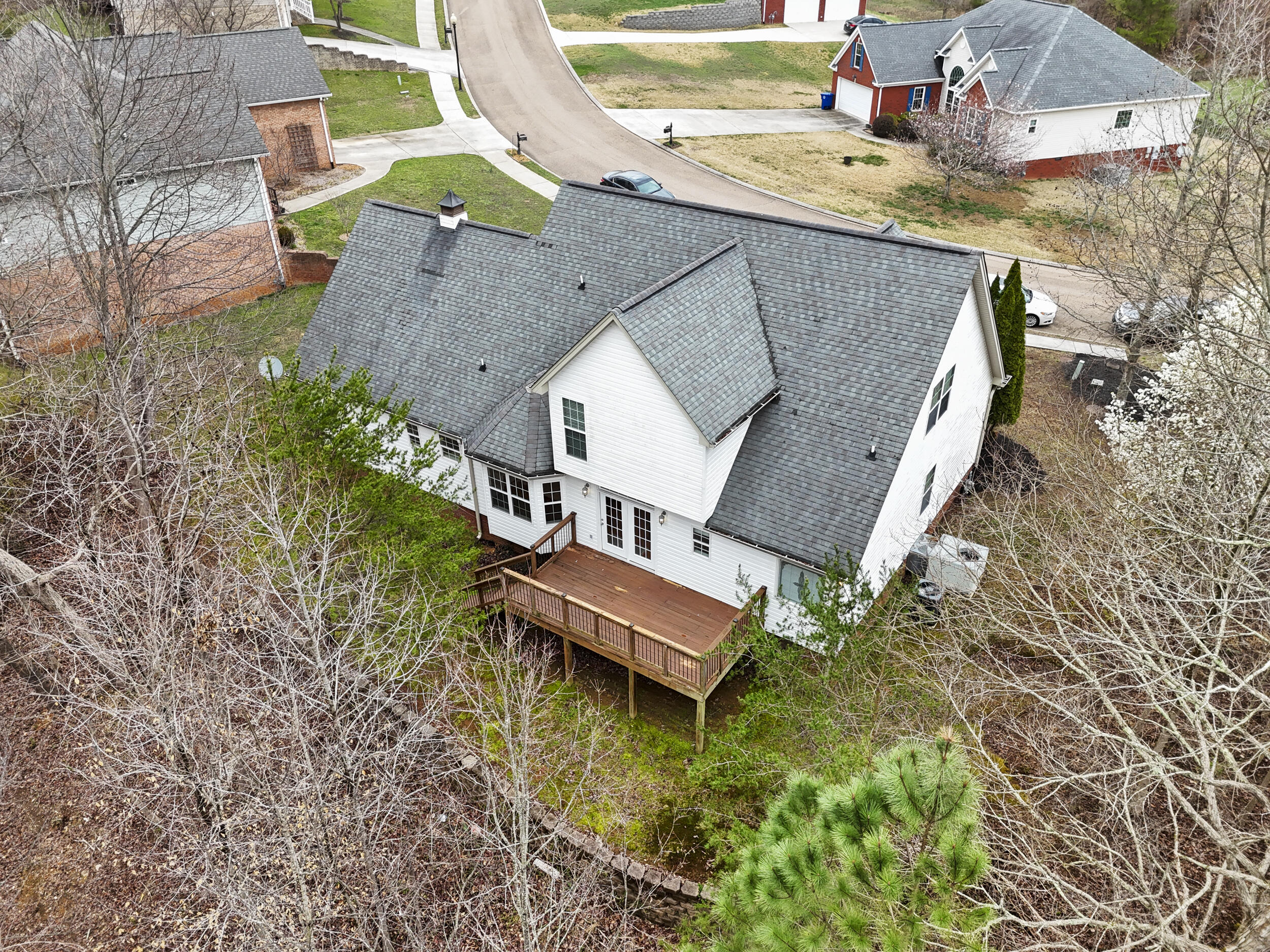 5542 Ginkgo Road Ooltewah, TN 37363 - Photo 5 of 43 dji_20260310001459_0659_d