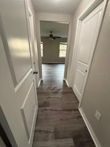 a view of entryway with wooden floor