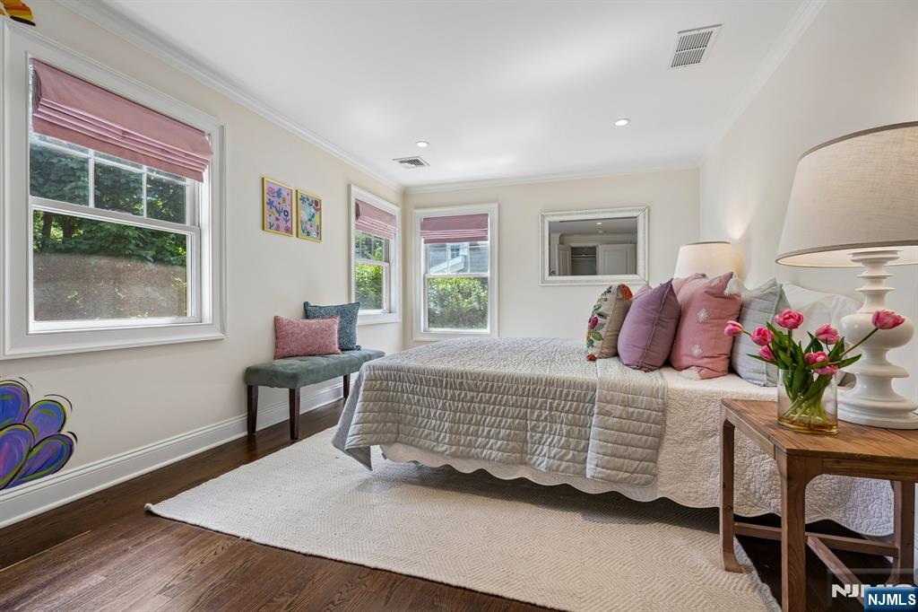 11 Mt Vernon Road Montclair, NJ 07043 - Photo 28 of 49 a bedroom with a bed table chair and a window