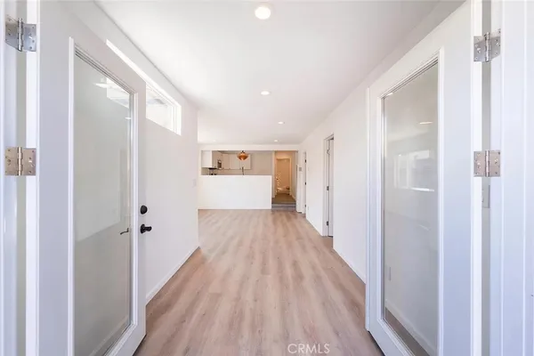 a kitchen with stainless steel appliances a stove a sink and a microwave
