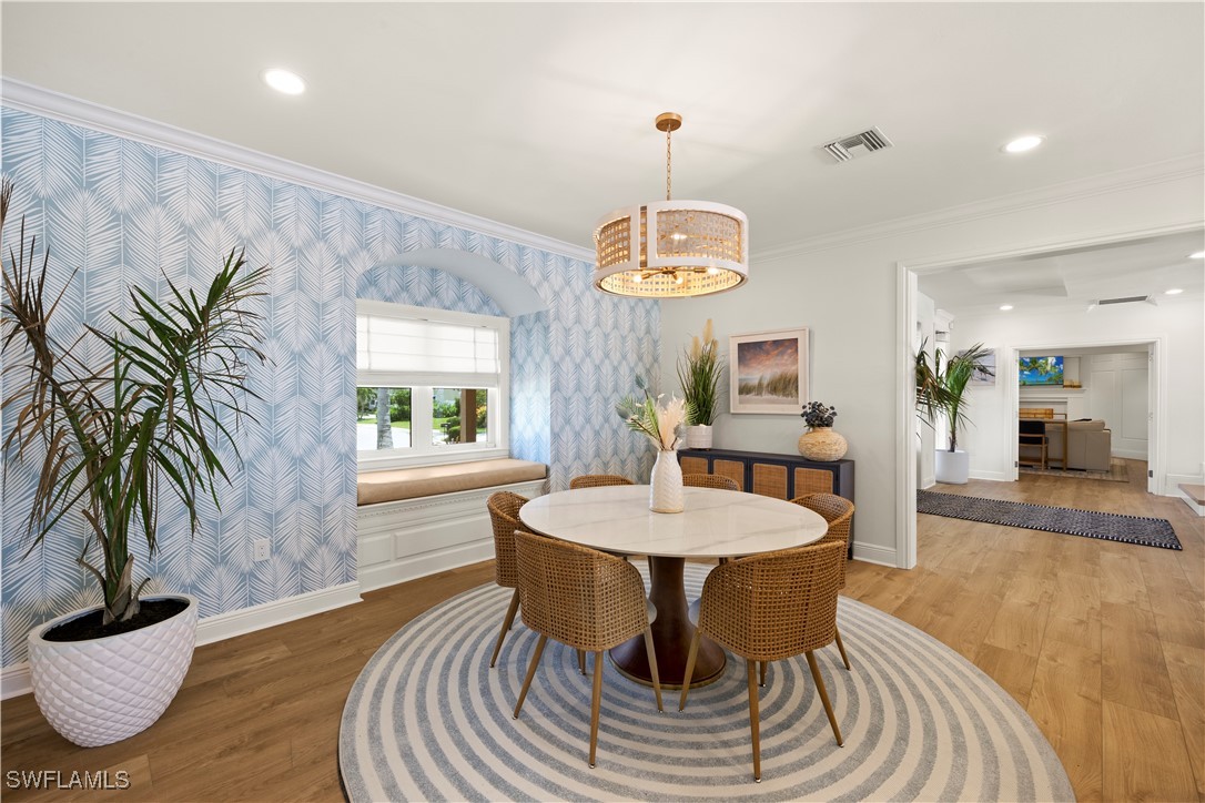 8451 Casa Del Rio Lane Fort Myers, FL 33919 - Photo 12 of 50 a view of a dining room with furniture