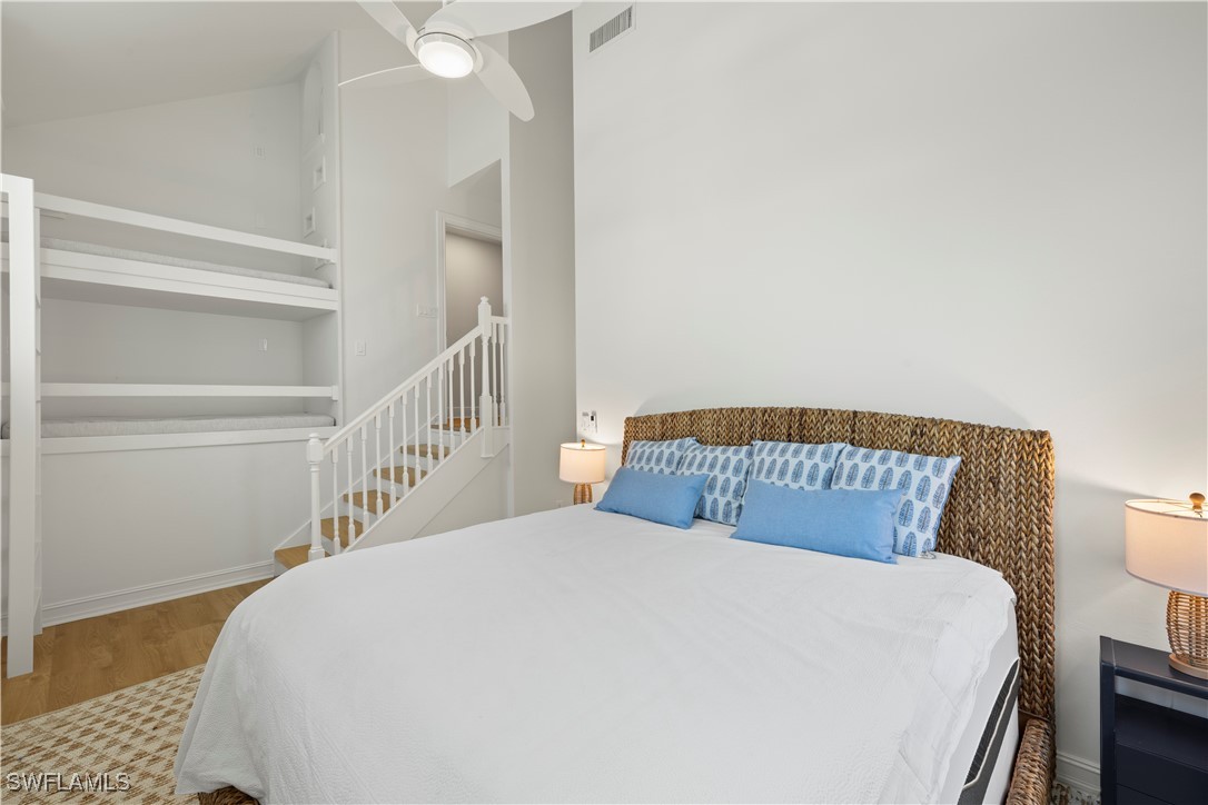 8451 Casa Del Rio Lane Fort Myers, FL 33919 - Photo 38 of 50 a bedroom with a bed and a window