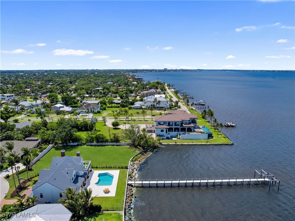 8451 Casa Del Rio Lane Fort Myers, FL 33919 - Photo 47 of 50 an aerial view of a house with a garden