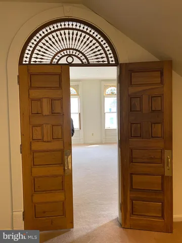 a view of entryway with a front door