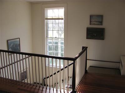 108 Shore Road Chatham, MA 02633 - Photo 22 of 31 a view of staircase with white walls and a window