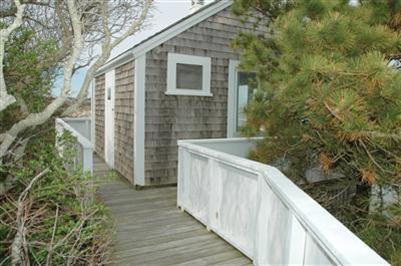 108 Shore Road Chatham, MA 02633 - Photo 5 of 31 a balcony with view of trees