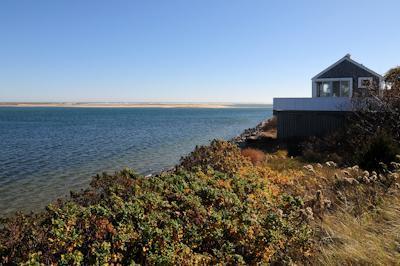 108 Shore Road Chatham, MA 02633 - Photo 7 of 31 a view of a lake with a field