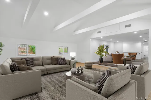 a living room with furniture and a couch