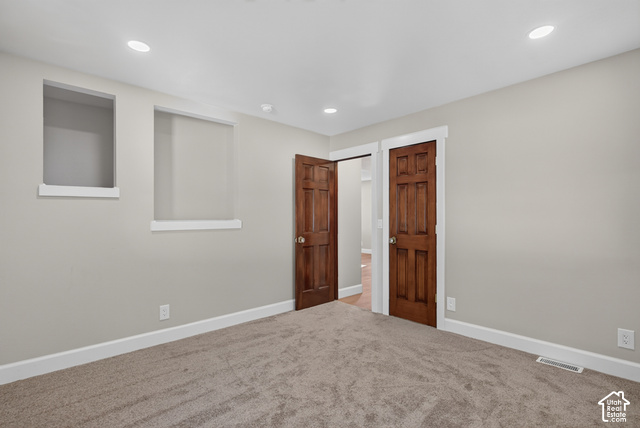 147 Center Street Clearfield, UT 84015 - Photo 24 of 55 Recessed lighting, wood-finish panel doors, light-toned carpeting, and neutral wall paint
