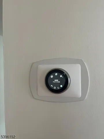 a large white bed in a white room