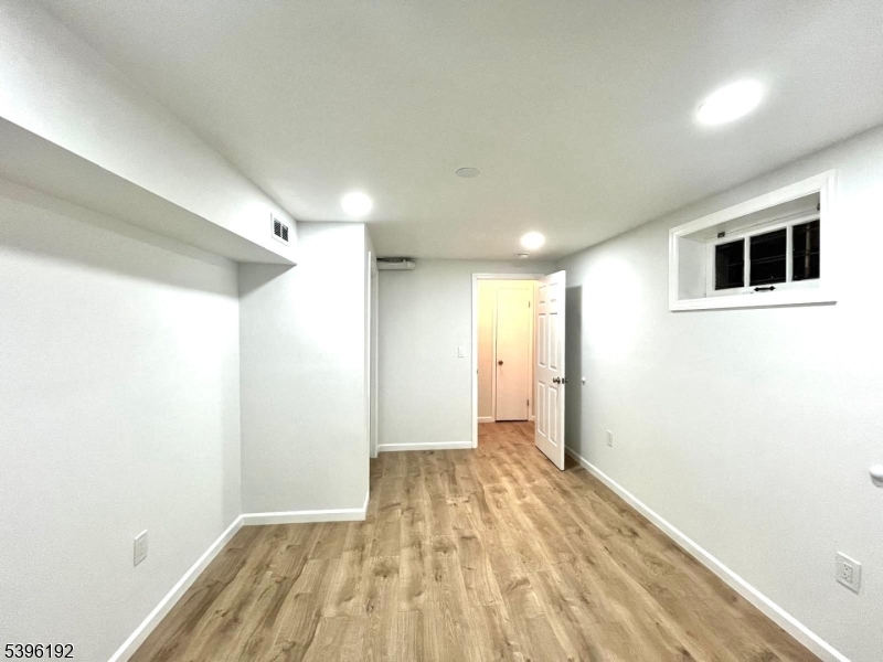 118 Bluebird Drive, Unit 3A Hillsborough, NJ 08844 - Photo 6 of 29 a view of hallway with wooden floor