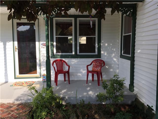 Imagine sitting here in the shade of a large Japanese maple, listening to the birds singing, and watching the world go by!