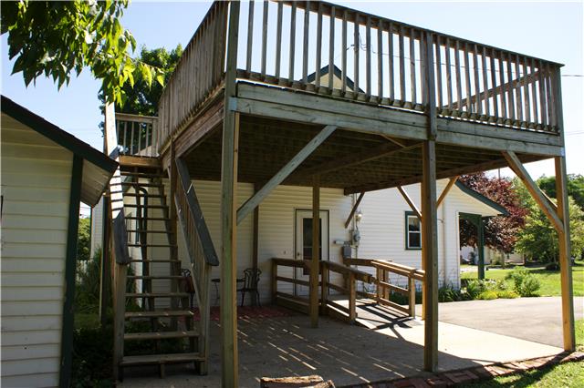 In addition to a large yard with fruit trees, there is an upper deck, and also 300 sq. ft. of storage upstairs, off the deck.