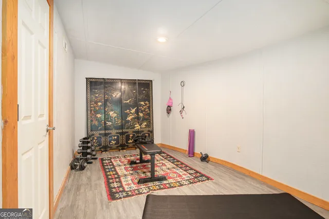 a living room with couch and a table