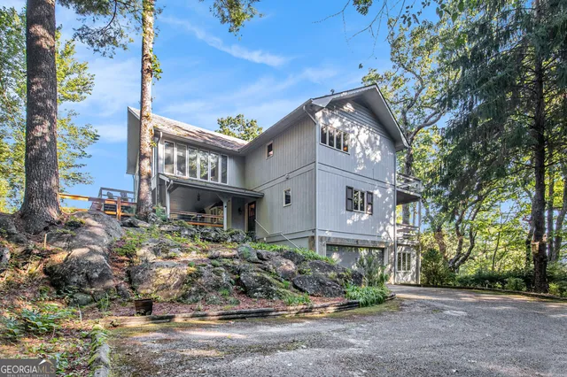 a front view of a building with garden