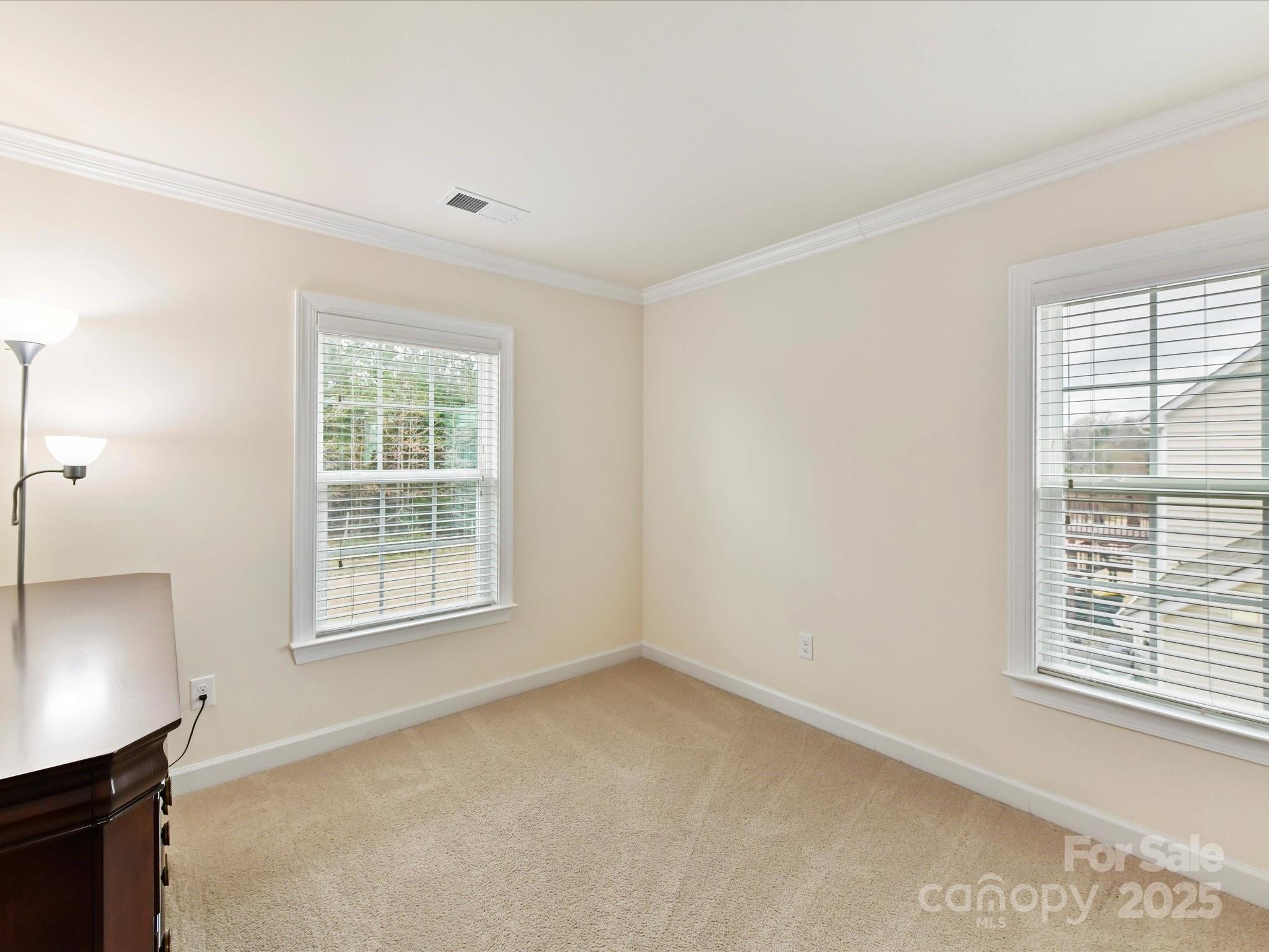 9895 Travertine Trail Davidson, NC 28036 - Photo 26 of 48 an empty room with a window