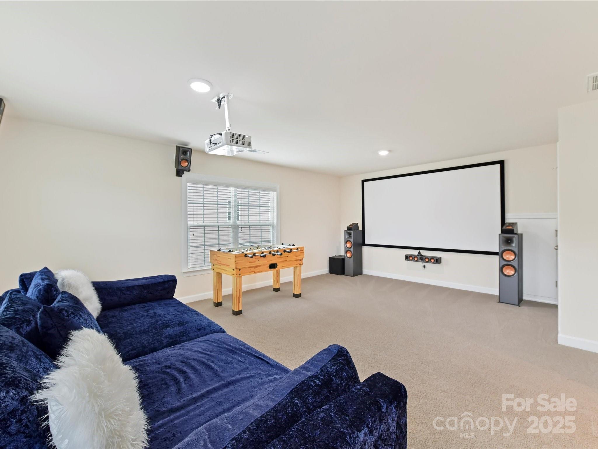 9895 Travertine Trail Davidson, NC 28036 - Photo 38 of 48 a living room with furniture