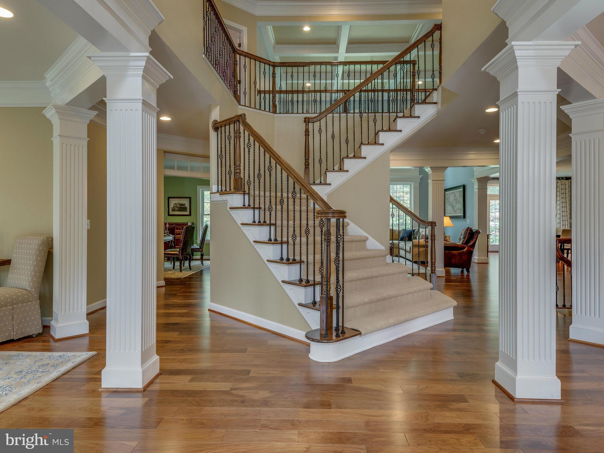 1667 Hunting Crest Way Vienna, VA 22182 - Photo 14 of 30 Staircase to upper level
