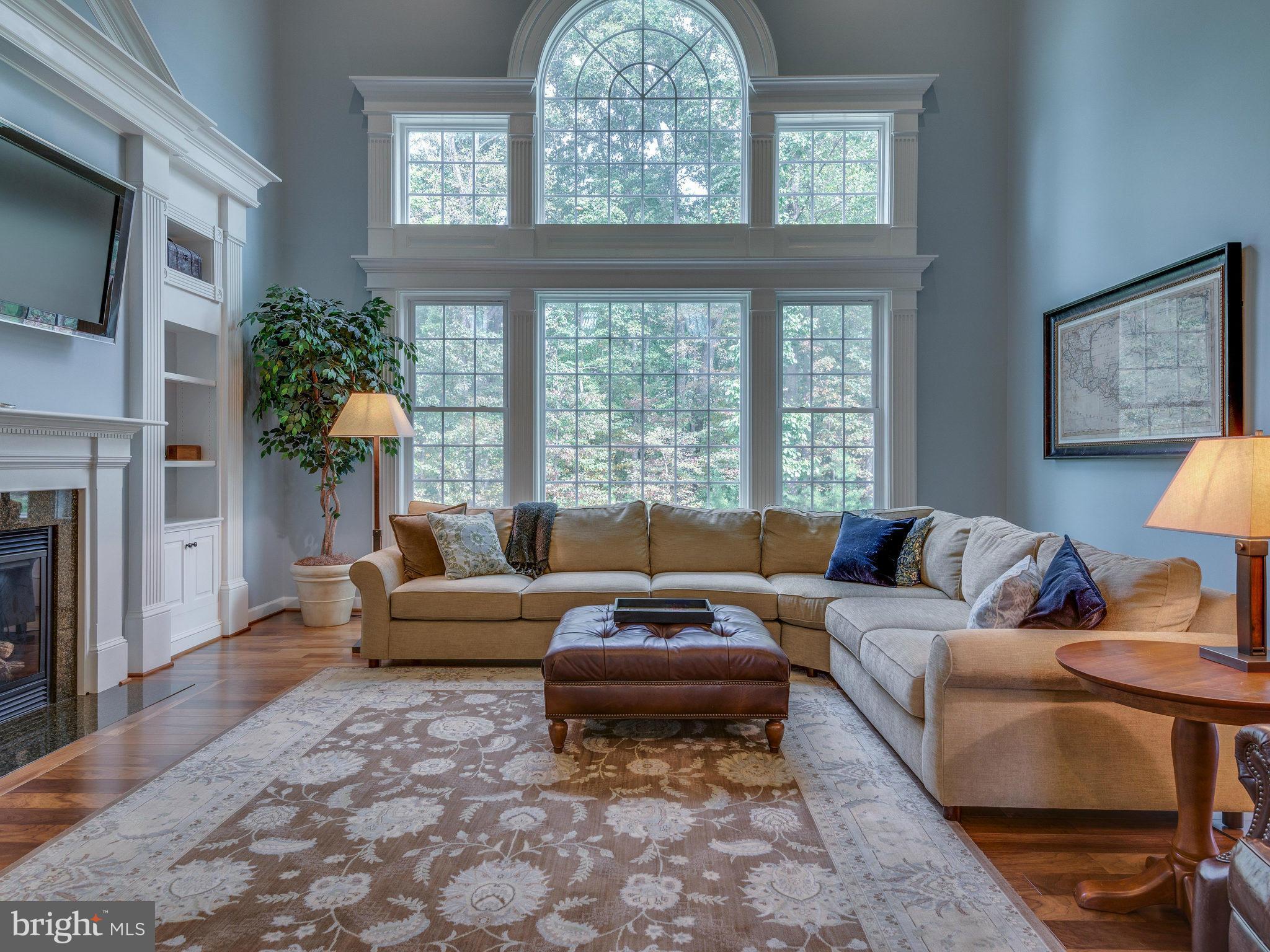 1667 Hunting Crest Way Vienna, VA 22182 - Photo 7 of 30 Family Room / with view of wooded yard