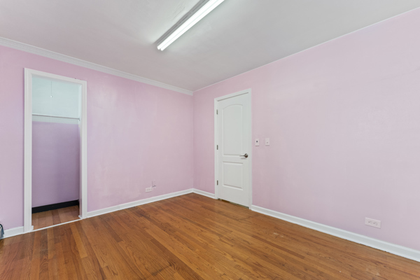 5322 West Addison Street Chicago, IL 60641 - Photo 11 of 21 a view of empty room with wooden floor