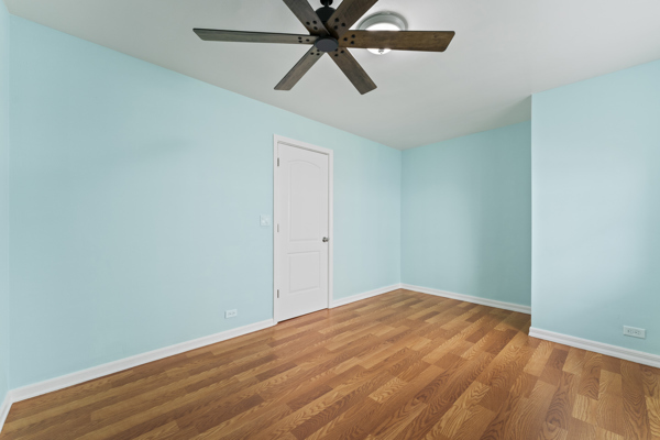 5322 West Addison Street Chicago, IL 60641 - Photo 14 of 21 an empty room with closet and fan